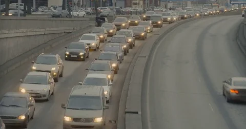 Traffic in the city evening Видео 73395445