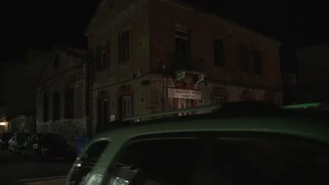 The traffic at the city intersection at night Stock Footage 138785505