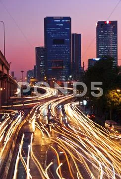 Traffic in city at night Stock Photos