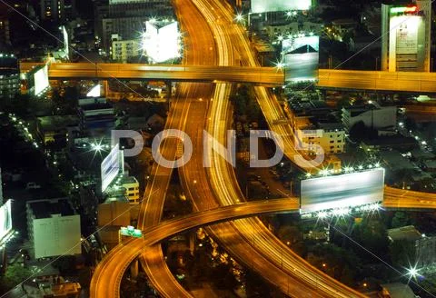 Traffic in city at night Stock Photos