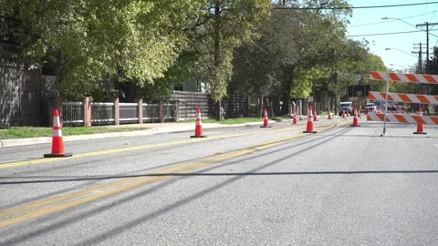 Traffic closed off on one side of street  Stock Footage 292825512