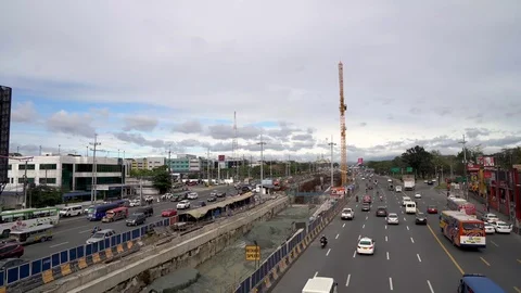 Traffic on Commonwealth Highway with MRT construction Stock Footage 124573763