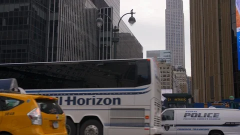 Traffic Commuting On A Classic Eighth Avenue With The Impressive Empire State Stock Footage 114057466