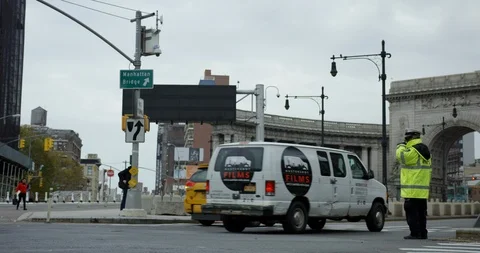 Traffic Commuting Towards Beautiful Manhattan Bridge With A Traffic Warden  Stock Footage 112602139