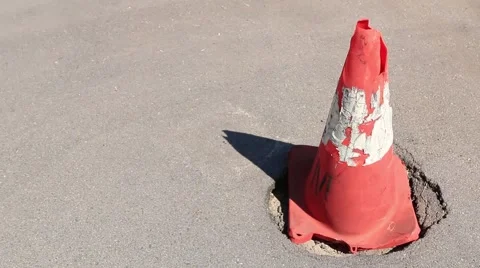 Traffic Cone on Pothole Stock Footage 58471518
