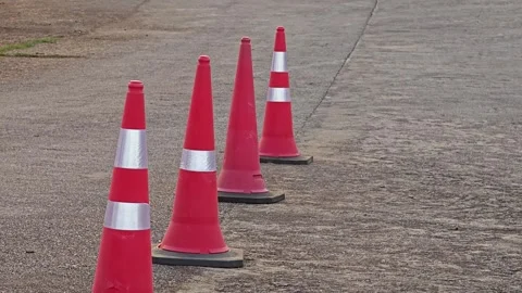 Traffic cone is set on road, ensuring safety. Stock Footage 304942961