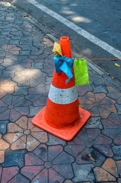 A traffic cone on the sidewalk Stock Photos