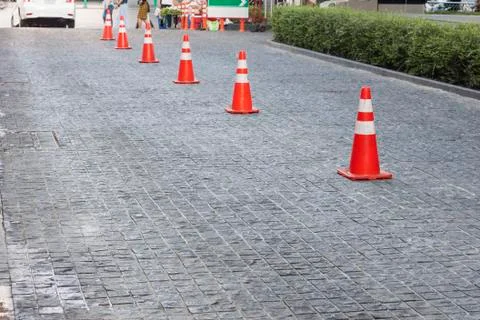 Traffic cones placed on the road surface To divide the lane into two lanes fo Stock Photos