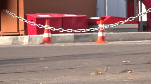 Traffic cones. A strong wind blows away the leaves. Video stock 55273249