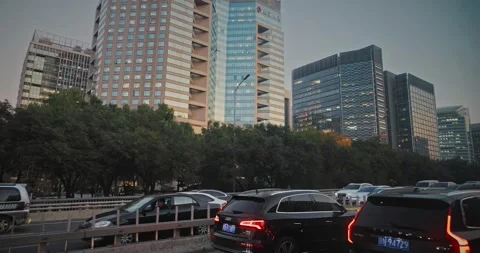 Traffic congested urban road lined with stunning towers. Stock Footage 315599260