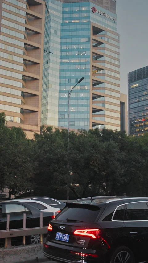 Traffic congested urban road lined with stunning towers. Stock Footage 336348654