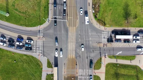Traffic congestion at an intersection in a busy urban area showcasing vario.. Stock Footage 296094885