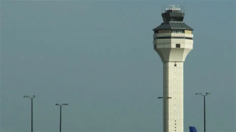 Traffic control tower plane flyby Stock Footage 38409540