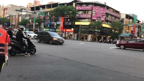 Traffic cop conducting  at intersections in New Taipei City, Taiwan Stock-Footage 159522574