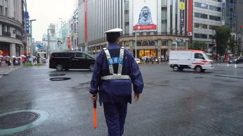 Traffic Cop in Tokyo, Japan Stock Footage 104415084