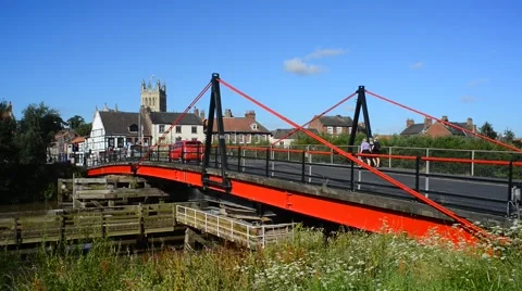Traffic crossing over the river ouse using selby swing bridge, selby, uk Stock Footage 65582209