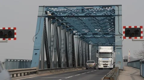 Traffic crossing the river Ouse across Boothferry road swing bridge howden uk Video stock 48993641