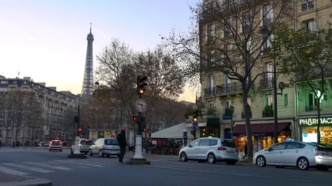 Traffic at the crossroad with the Eiffel tower in the evening,ultra hd 4k Stock Footage 74853970