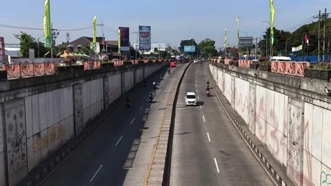 Traffic density vehicles in the underpass tunnel. East Java - October 1, 2025 Stock Footage 322549129