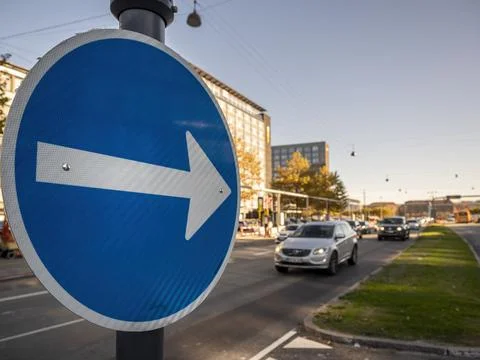 Traffic directional arrow plate on a post along Bernstorffsgade Stock Photos