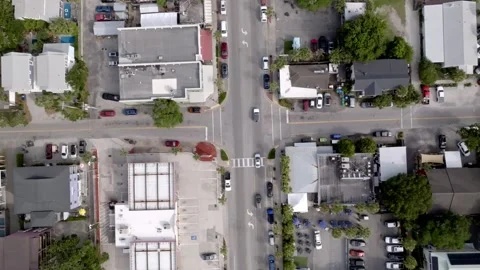 Traffic at a downtown intersection in Folly Beach, South Carolina. Video stock 335924871