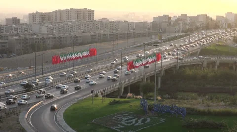 Traffic drives over a bridge in Tehran, Iran Video stock 33918219