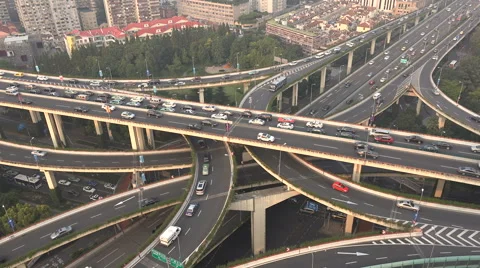 Traffic drives over a busy elevated highway in Shanghai, time lapse video Stock Footage 60700663
