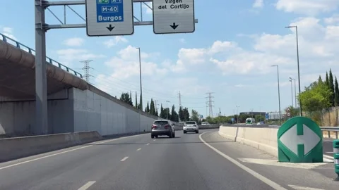 Traffic driving along A-1 service road in Madrid 스톡 동영상 339026460