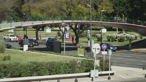 Traffic driving below pedestrian bridge in Recoleta neighborhood Stock-Footage 140623055