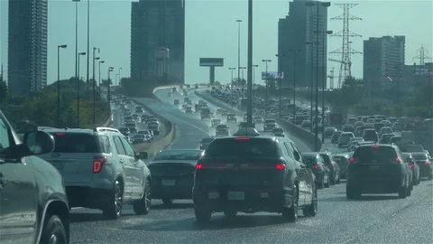 Traffic driving into city Stock Footage 118077771