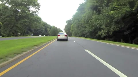 Traffic Driving Down Road Stock Footage 59791975