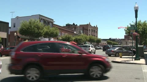 Traffic driving through downtown. (1 of 2) Stock Footage 8982016