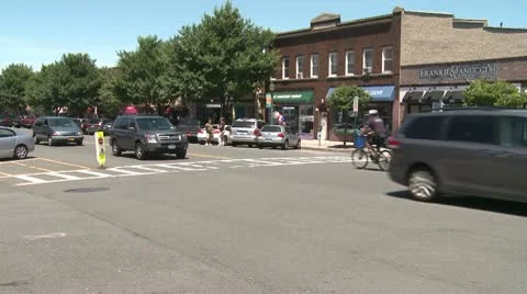 Traffic driving through downtown. (2 of 2) Stock Footage 8981998
