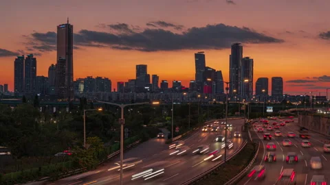 Traffic during sunset at Han river side. and skyscraper business and financial Stock Footage 141647046