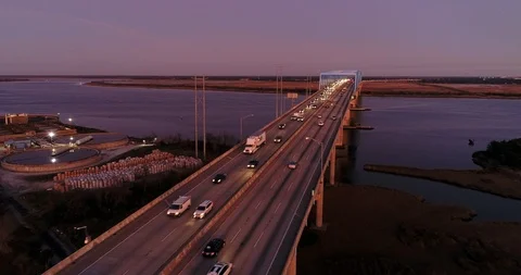 Traffic during sunset over Don N. Holt Bridge in Charleston, SC Stock Footage 124144484