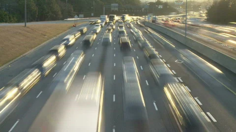 Traffic at dusk Stock Footage