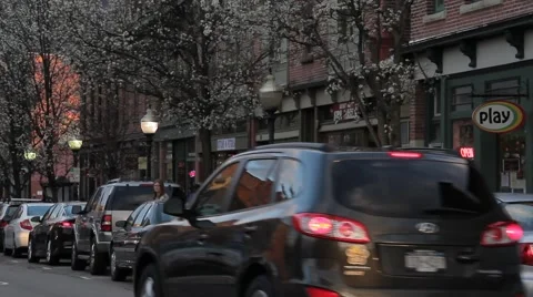 Traffic at dusk on Small Town Main Street Spring Stock Footage 61833427