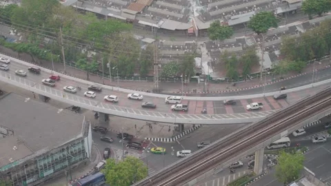 Traffic on the elevated road in Bangkok, in front of Chatuchak Weekend Market. Stock Footage 308492175