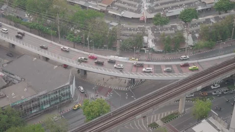 Traffic on the elevated road in Bangkok, in front of Chatuchak Weekend Market. Stock Footage 308492178