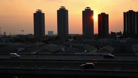 Traffic on the evening street at sunset is falling. Stock Footage 77312074