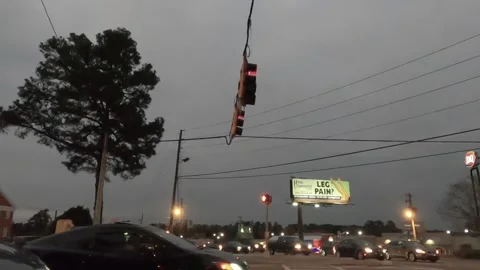 Traffic in the evening on Washington road in Augusta Georgia at an intersecti Stock Footage 148516423