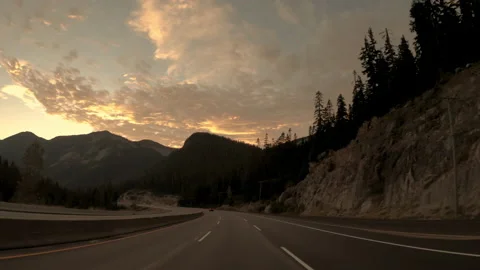 Traffic on the expressway in the mountains at dusk. Stock Footage 140742296