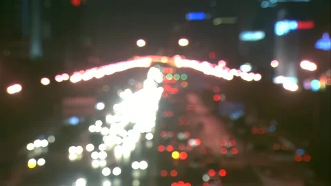 Traffic flow in the city at night Stock Footage 253773191