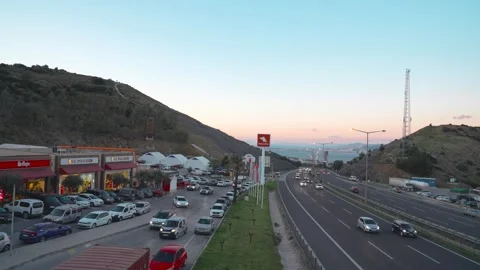 Traffic Flow on a Highway Next to a Rest Area in Izmir, Turkey Jan 19, 2026 Stock Footage 328257725