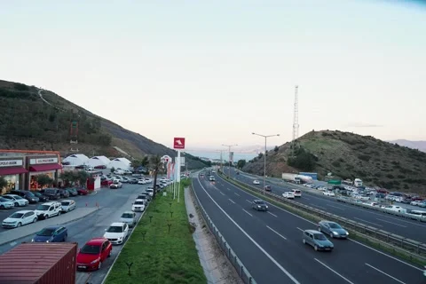 Traffic flow on a highway in a rest area timelapse in Izmir- January 19, 2026 Stock Footage 327095976