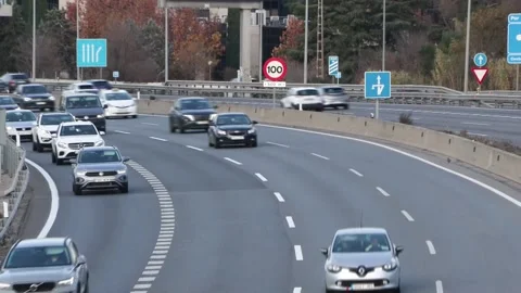 Traffic flow into Madrid via the A-1 motorway on the last day of the December lo Stock Footage 323137793