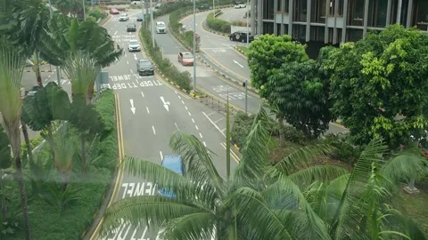 Traffic Flow on Multi Lane Road Near Singapore Changi Airport 스톡 동영상 342252113