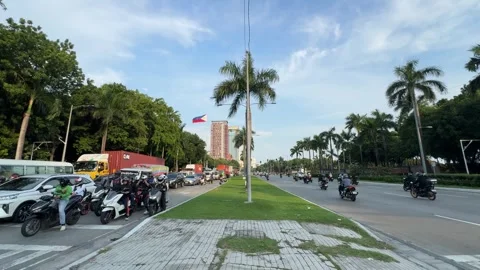 Traffic Flow Outside Luneta Park, Manila 4K 60fps 스톡 동영상 338400392