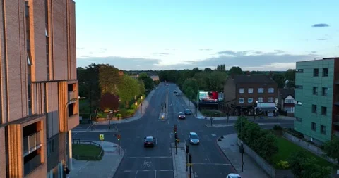 Traffic flow on road between apartment buildings Stock-Footage 201754614