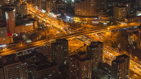 Traffic flow street road intersection traffic volume at night Stock Footage 270657715